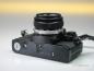 Preview: Olympus OM-10 black mit Manual Adapter und Zuiko 1.8/50mm